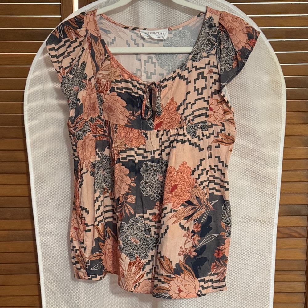 Elegant Floral and Geometric Blouse in Peach and Navy